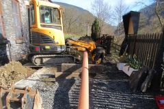 ... while a new pipe has been delivered for the drain as excavation for it continues ...