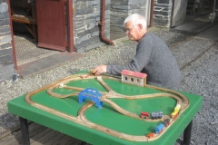 ... and Paul cleaning up the Brio train for (mostly) younger passengers' entertainment!