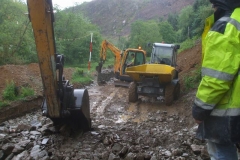 … when the heavens open! The last dumper load of the day was all hand-picked small stone, and when tipped had a high proportion of liquid content!
