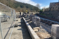 Block work starting to go in, forming the rear of the new platform