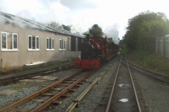 ... and the two locos depart top and tail with the passenger stock to Wharf for the evening train ...
