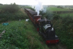 ... which is seen here passing Cynfal with Jack driving No. 7 ...