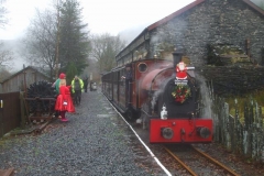Later, the Guard gives the right away as Santa's elves wave the passengers off ...