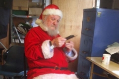 ... as Santa checks his satnav and diary to make sure he is in the right place at the right time!