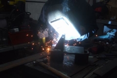 Friday, 28.1.2022. Adrian continues fabricating brackets for standardising buffing arrangements on the ex-Trecwn vans.