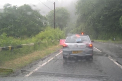 Monday, 13.7.15. Traffic lights have been set up at Pont y Goedwig in persisting rain …