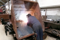 In the Carriage Shed, Adrian is welding in strengthening plates to tipper bodies ...