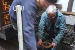 Chris and Bob are re-greasing buffers on carriage No. 22 …
