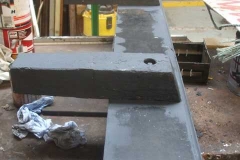 ... while nearby, the end board for waggon No. 218's deck, has been repaired and a re-paint started.