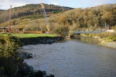 Southern Extension. New Dyfi Bridge (road) scheme. Monday, 5.12.2022. A rare tandem crane lift of a large girder to add to the incrementally-launched main viaduct is scheduled for today (in superb conditions)