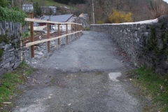 Corris Station Project. Wednesday, 13.3.2019. Yesterday, railings were added to the posts of the new railway fence line to better define the re-aligned farm lane.