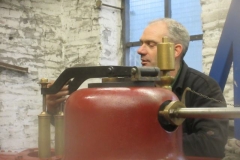 ...  and temporarily assembles the safety valves for photographic purposes - although new arms are being made.