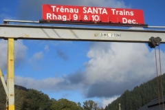 During the day, the Santa advertising board is assembled and erected on the gantry.