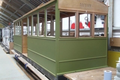 … and in the Carriage Shed, the first primer has been applied to two sides of carriage No. 23.