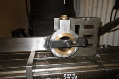 Machining is taking place on the connecting rod.