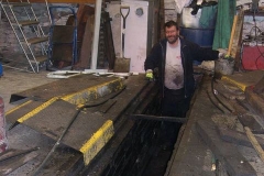 … Patrick clearing the Engine Shed pit of obstructions to water flow!