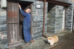 Saturday, 1st April 2017. Dave cleans down the doors to the S&T Shed & Stable, supervised by Billy …