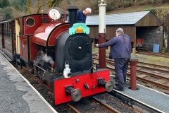 Paul and Andrew water the loco.