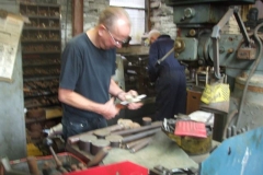 In the Engine Shed, Chris and Bob continue their work fabricating new screw couplings …