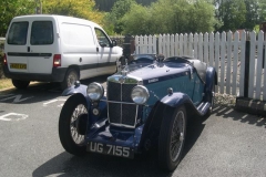 … and his old MG outside.