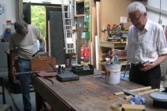 … while Steve gives the battery box another coat of varnish and Phil primes the lamp brackets for No. 11.