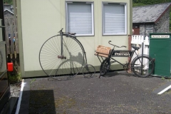In Corris, new member Steve Poynter displays a couple of interesting ‘bikes on the platform for inspection …