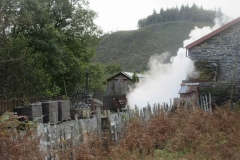 Later, a cloud of steam erupts alongside the Engine Shed ...