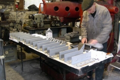 (January) Degreasing and painting bogie parts.