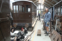 Meanwhile, a jack is positioned to lift carriage No. 23 …