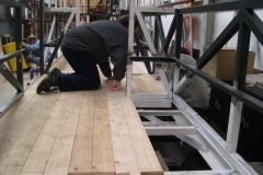 … so they quickly set about removing the planks for sealing prior to securing them in position.