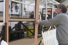 Neil offers a timber section to the body frame of carriage No. 23 …