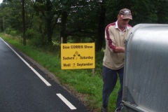 Sunday, 11.8.2019. Just north of Maespoeth, Tom has just set up one of several signs for the Corris & District Show – will you be there?