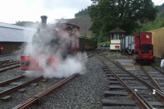 Sunday, 18.8.2019. After all the swopping of locos, No. 11 brings up the carriages while the last 60 lb per sq.inch or so of steam pressure on No. 7 is raised on the loop road.