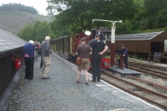 … and passengers line up to photograph No. 7 being watered.