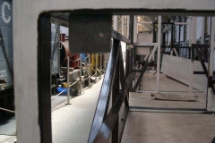 Mountings for retaining disabled person’s fold-up seats in carriage No. 23 have been welded in place …