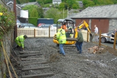 Saturday 21st May saw a working party relaying the track into the original Corris Station platform road.