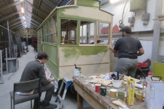 ... as Zach and Theo start on priming the north end of carriage No. 24's body ...