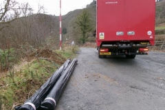 There is a brief break as more geotextile is delivered - just in time!