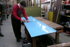 In the Carriage Shed, roof sheets are being prepared for carriage No. 24 ...