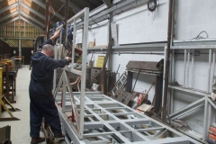 After lunch, Adrian starts setting up body side frames on carriage No. 24 …