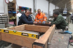 ... while Bill, Tony and Mark ponder over the construction of the underframe for the Drop-side Heritage waggon.