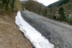 Meanwhile, fresh geotextile has been laid out prior to re-shaping much of the material already delivered, but it is still very wet - but drying up nicely! The viewpoint here is roughly, at the height of the proposed trackbed formation.