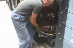 Tuesday, 26.7.2022. Peter starts to dismantle the dumb buffers on van No. 204 ...