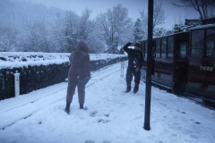 With passengers departed, a snowball fight breaks out amongst the operational staff. One way to warm up if not on the footplate!