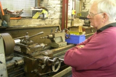 … while Graham resumes turning a valve spacer section for No. 7.