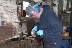 In the Engine Shed, Andy is fettling and fitting components to the last of the bogie stretchers for carriage Nos. 23 & 24 …