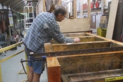 ... alongside Tony, who is sealing the timber frames for the Trestle Waggon.