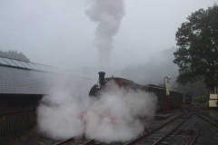 ... while No. 7 is almost lost in steam as it heads off to Corris on the first train of the day.