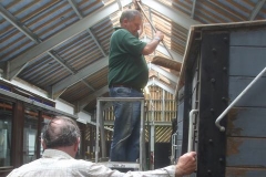 ... while in the Carriage Shed, Mark cleans up after the roof of the P. Way van has been re-boarded ...