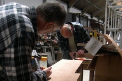 Derek and Charles work on parts for the vestibule of carriage No. 22 …